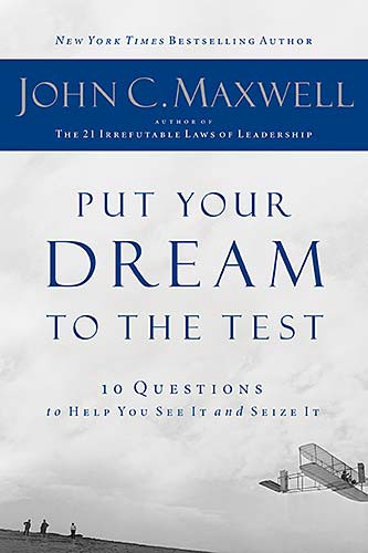 A book cover with the title of put your dream to the test.